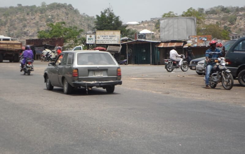 Okene 48 Sheet Board ALONG OKENE AUCHI ROAD BY CHECKING POINT, AJAOKUTA JUNCTION (INVM)