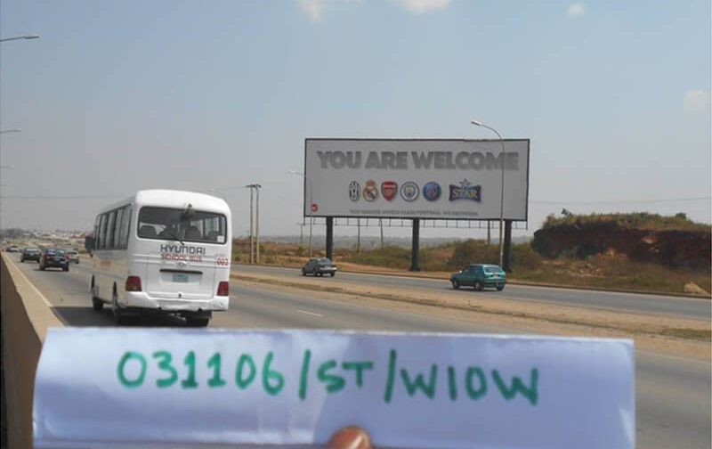 Abuja Mega board Along Airport Road By Lugbe Interchange (AM)