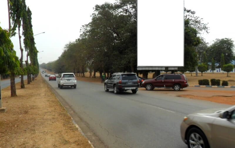 Abuja Portrait board Along Bill Clinton road FTT Airport (OMIC)